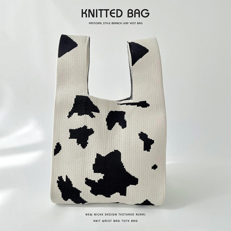 Spotted knitted shoulder tote bag