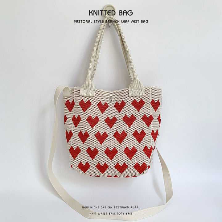 Bolso de punto a rayas de corazón