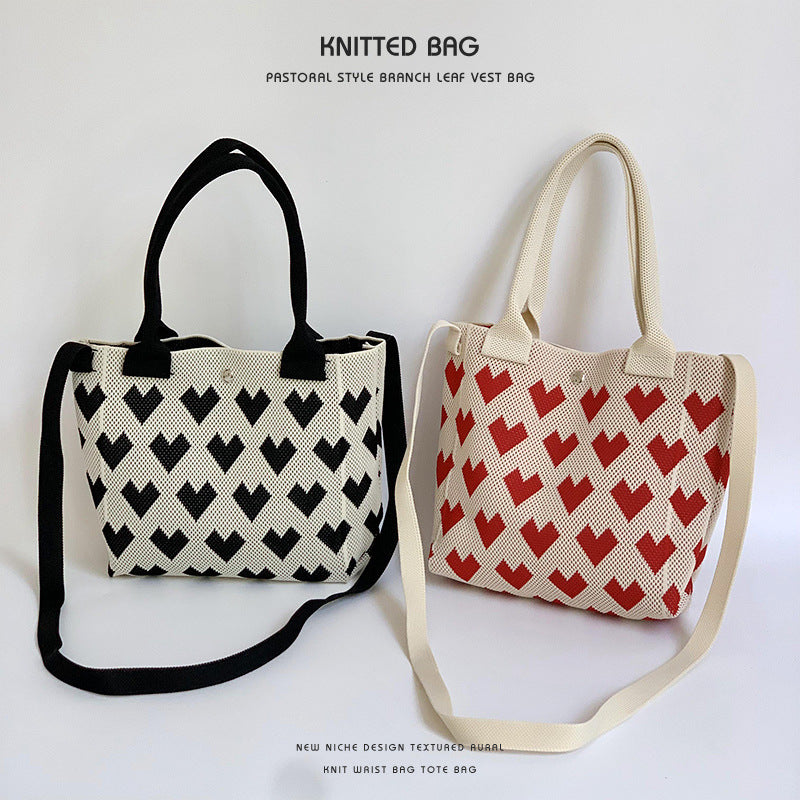 Bolso de punto a rayas de corazón