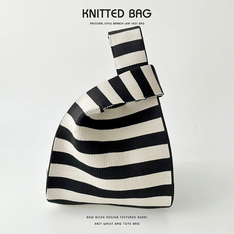 Polka dot striped knitted shoulder bag