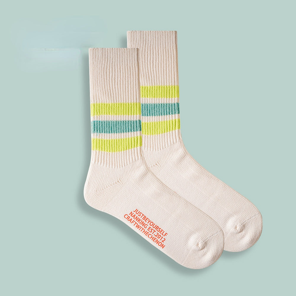 Chaussettes longues rétro rayées de couleur unie épaissies en coton peigné