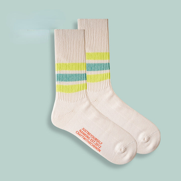 Chaussettes longues rétro rayées de couleur unie épaissies en coton peigné